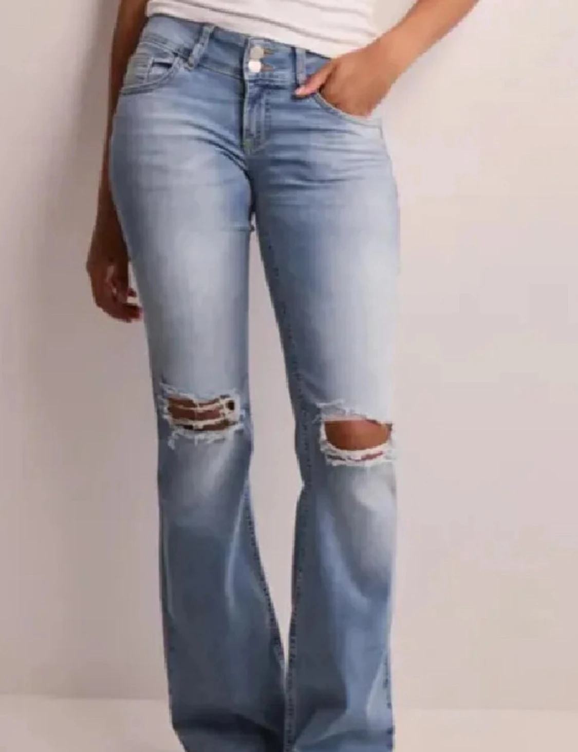 Snygga slitna jeans - 1