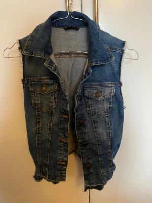 Denimväst  - Se bild 
