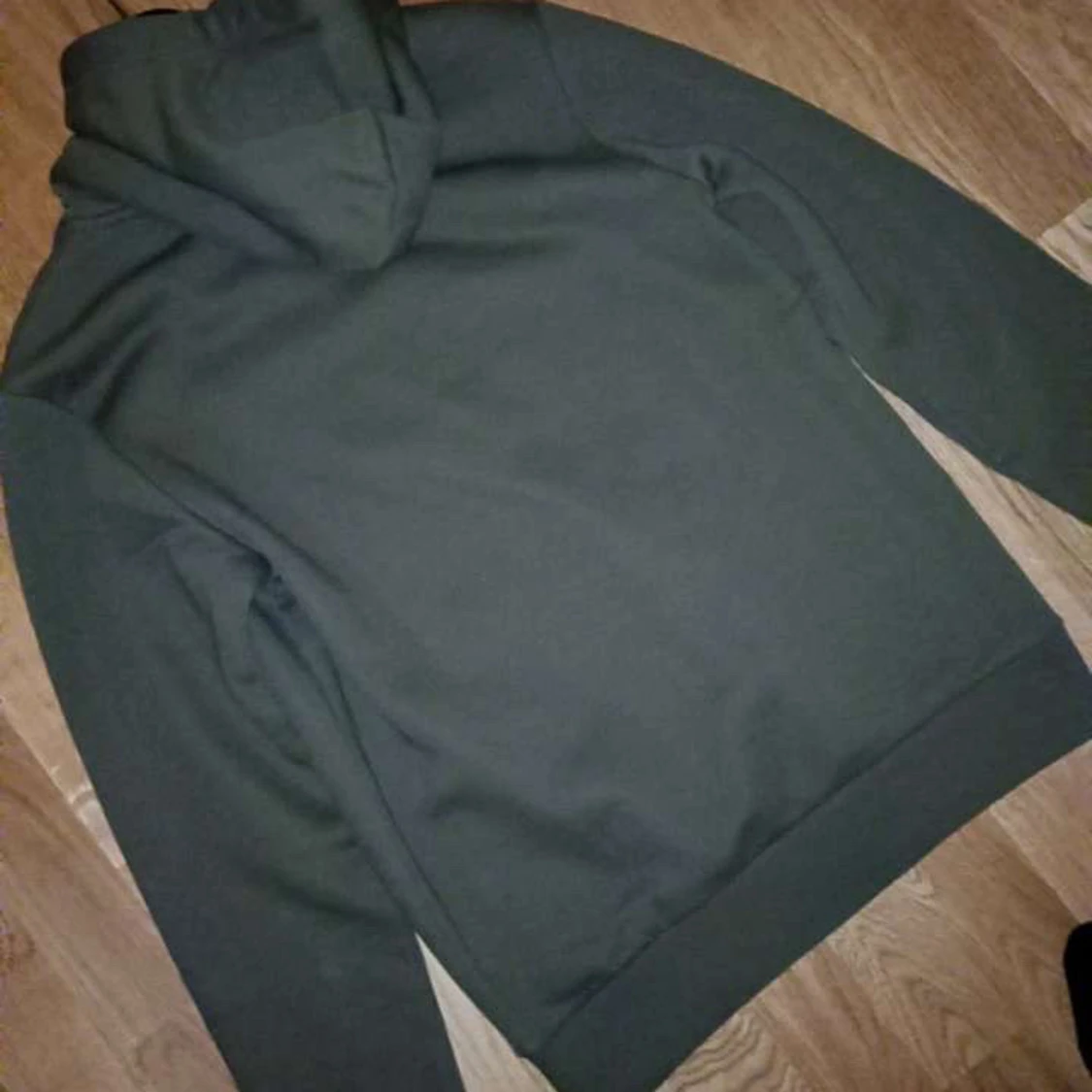 Grön hoodie från Peak Performance - 1