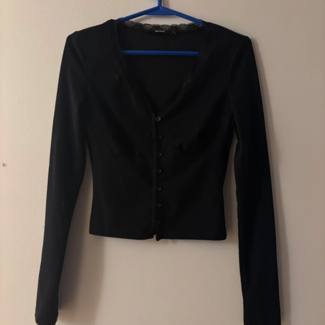 Svart långärmad blus från BikBok