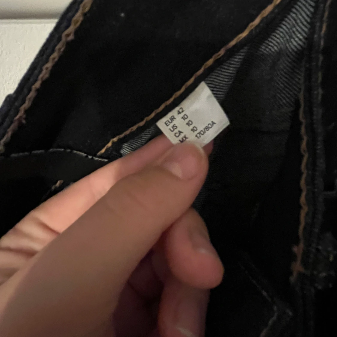 Mörkblå bootcut jeans i stl 42 - 2