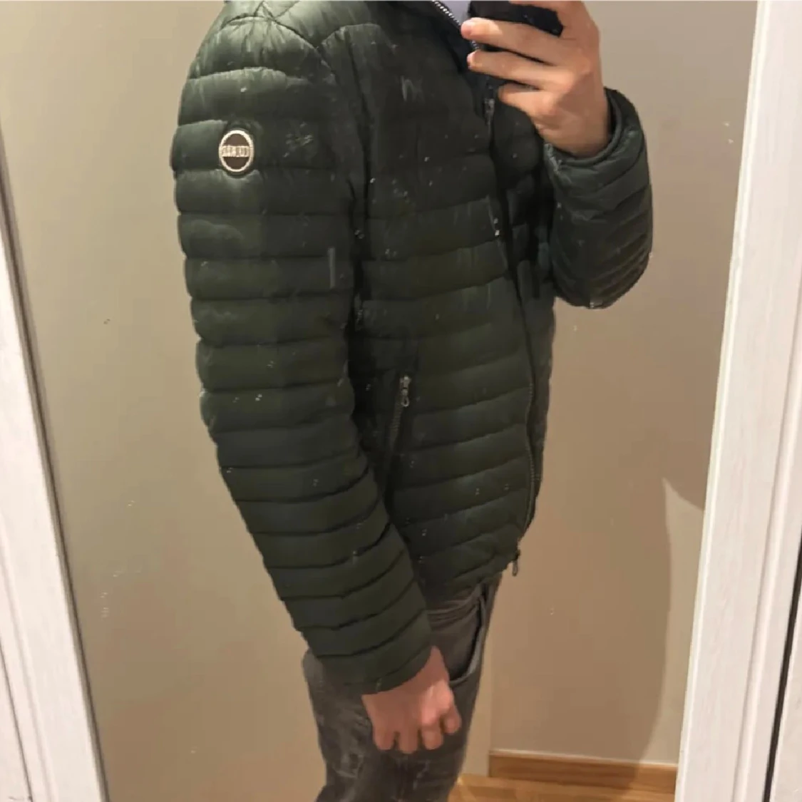 Mörkgrön pufferjacka från Colmar - 1