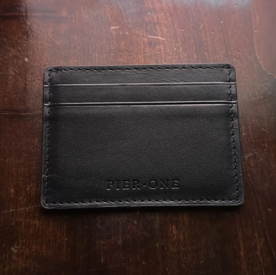Svart kortfodral från Pier One