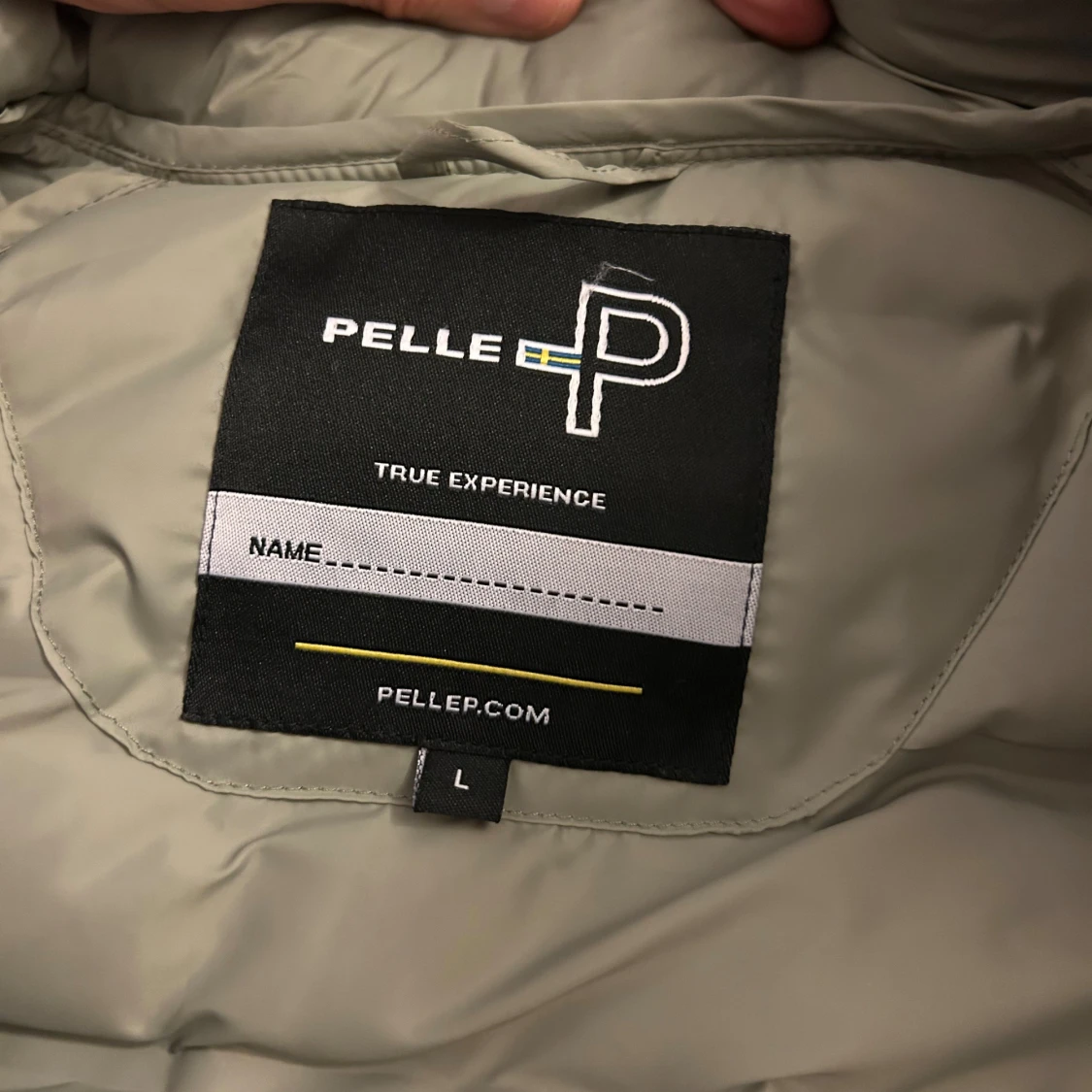 Ljusgrön dunjacka från Pelle P, stl L - 1