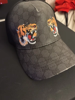 Tiger keps - Säljer en gg keps. Box och påse finns.