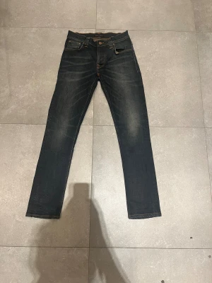 Nudie grim tim - Tjena, säljer nu dessa riktigt snygga nudie grim Tim i Stl W30L32. Dom är i riktigt bra skick. Nypris 1600✅Vid minsta funderingar så är det bara att höra av sig//Allt gott