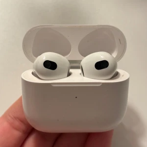 AirPods 3 - Airpods 3rd gen. Working perfectly, only a few scratches on the back of the case. Less than a year old. 