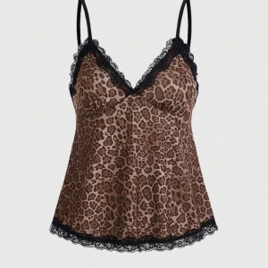 Leopardmönstrad linnetopp med spets - Snygg leopardmönstrad linnetopp med tunna axelband och svarta spetsdetaljer längs urringning och nederkant💗