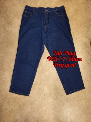 Fair Play jeans - The label says W26, but they seem bigger than that to me, when laid on the ground they measure 50 cm.  Features a long zipper and a wheat button. Small signs of wear, but nothing really to note.