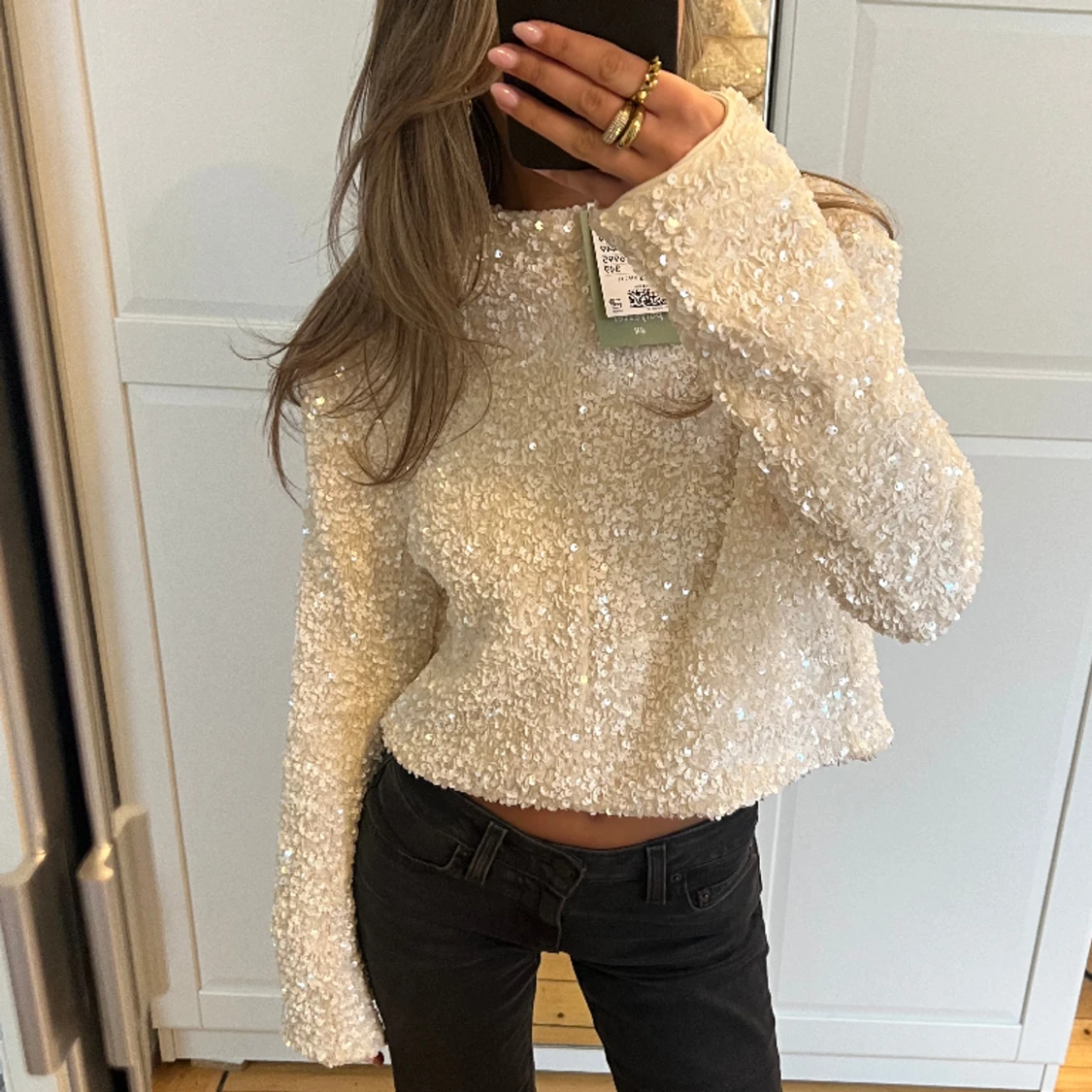 Paljettopp m rosetter - 91