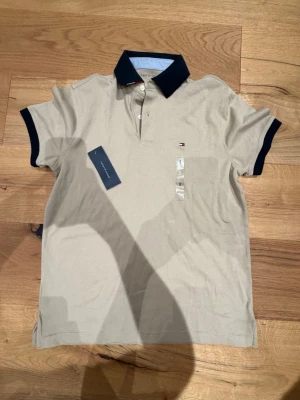 Tommy hilfiger polo - Perfekt skick helt ny-10/10)