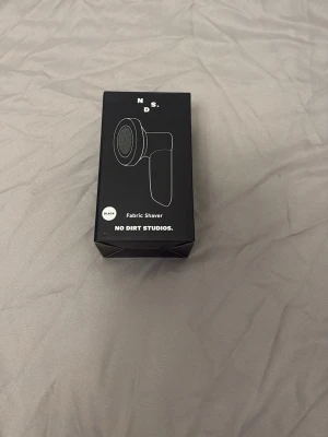 Tar bort noppriga grejer på kläderna - Helt ny 