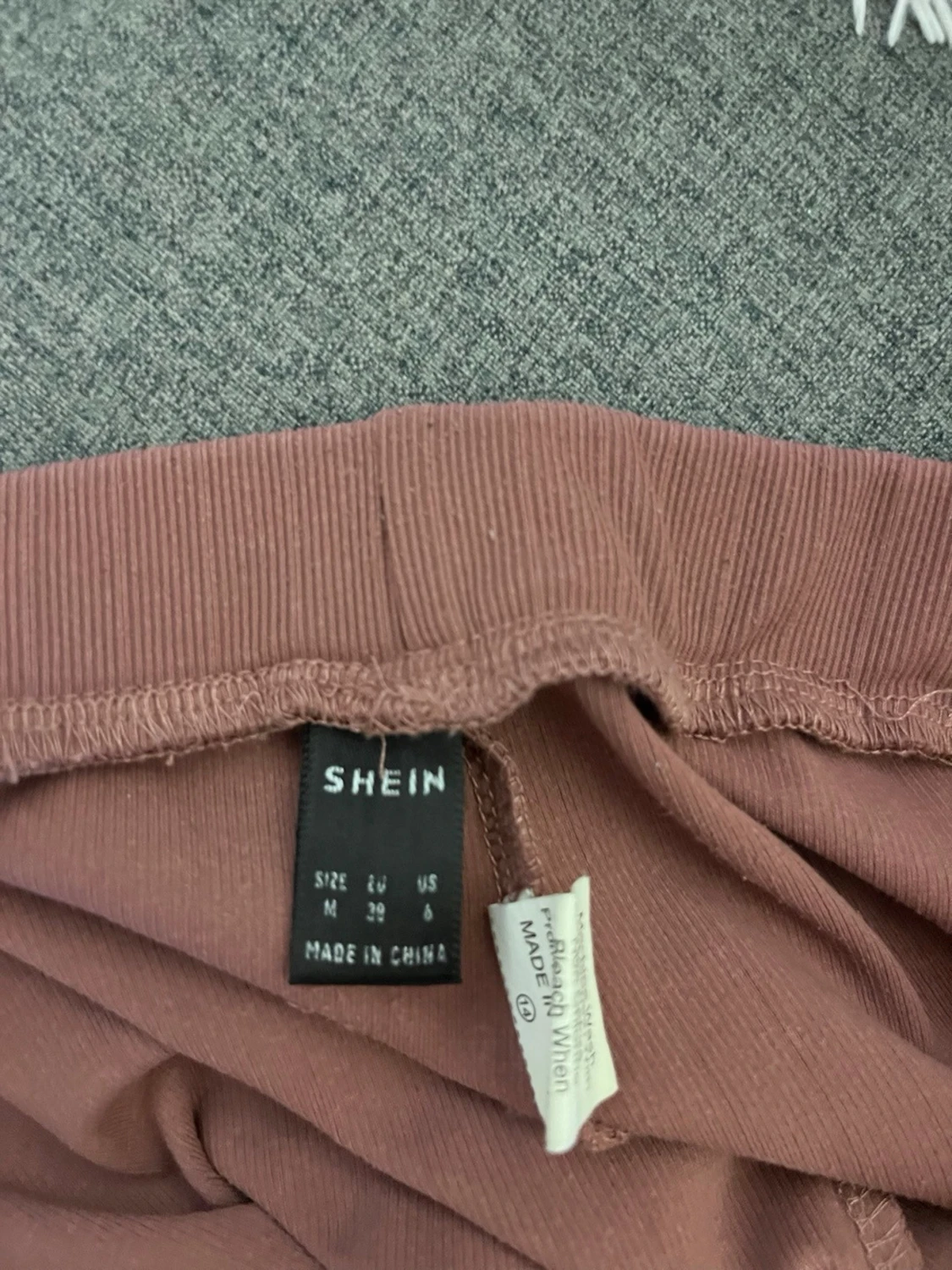 Rosa ribbad sett med dragkedja - 3