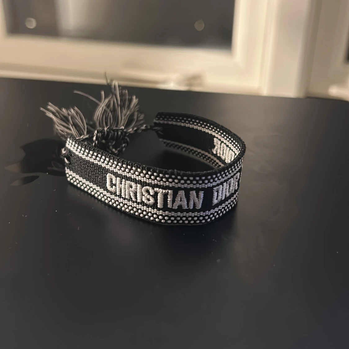 Svart Christian Dior armband