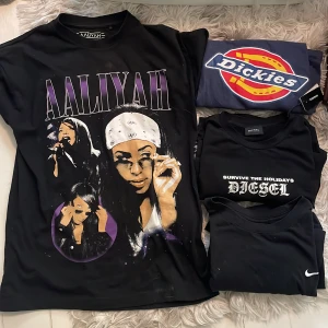 Svart Aaliyah t-shirt med tryck - Cool svart t-shirt med stort Aaliyah-tryck framtill i lila och vitt. En dickies T-shirts. En Nike tröja, en diesel tröja. Säljer dom för 100kr/st. Förutom Nike och diesel som är för 50kr/st. 