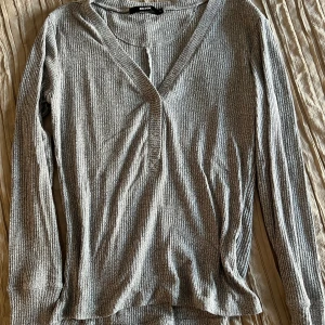 Tröja - Tröja med knäppning 