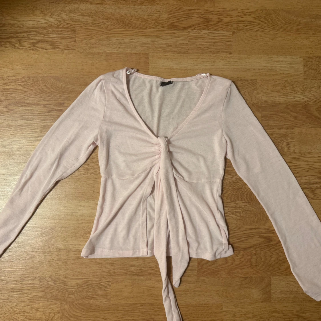 Ljusrosa omlottopp från Gina Tricot