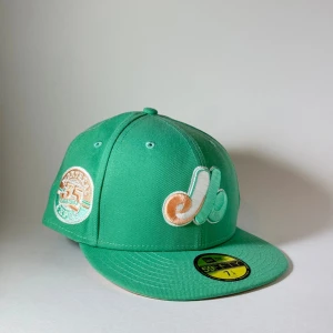 New Era 59Fifty Montreal Expos Mint Grön Keps Ny - New Era fitted keps i 59Fifty modellen med laget Montreal Expos på, helt ny. Storlek: 7 1/4” eller 57.7 cm