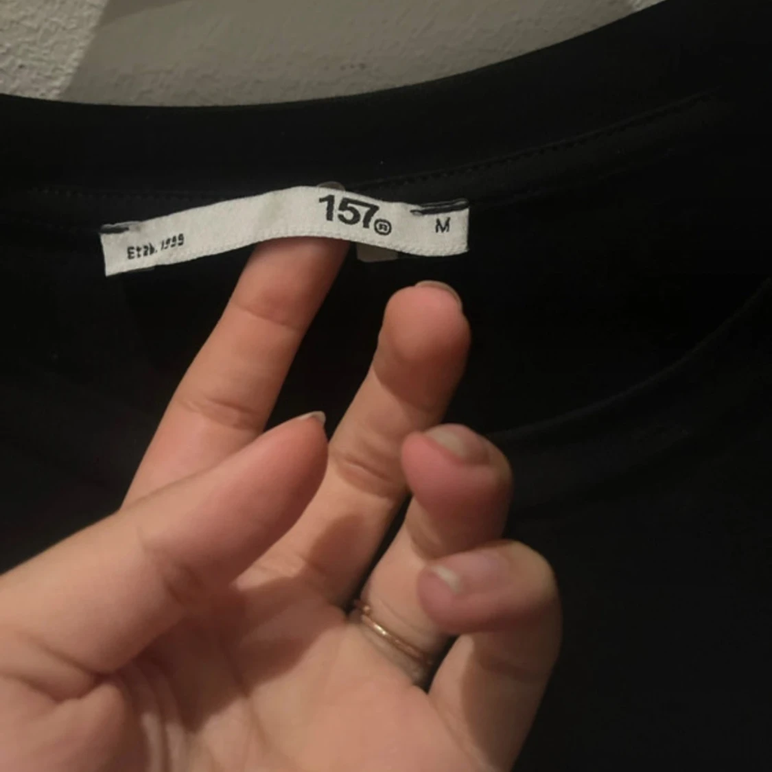 Svart långärmad topp med vida ärmar - 4