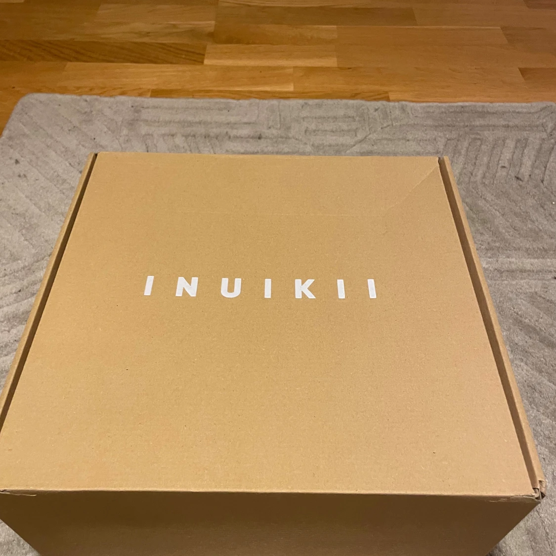 Beige Inuikii boots