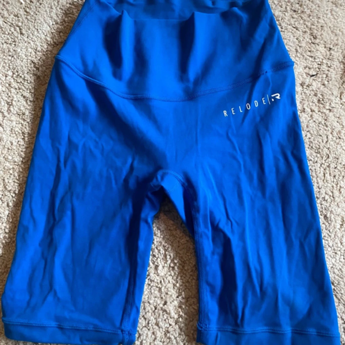 Blå träningstights shorts från Relode