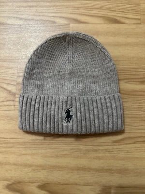 Ralph lauren mösa - En ralph lauren mösa jätte skön och perfekt för kalla väder