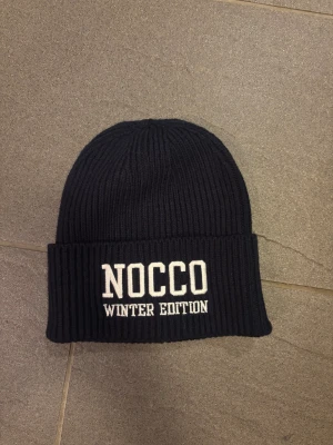 NOCCO mössa Winter Edition - Säljer en limiterad NOCCO mössa som är helt oanvänd. Storlek One size