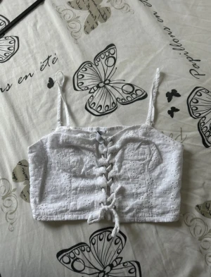 Cute summer top - Selling a super cute white summer top in the size XXS (kind of firs like a XS). Unsure if its from New Yorker or somewhere else. Never worn!