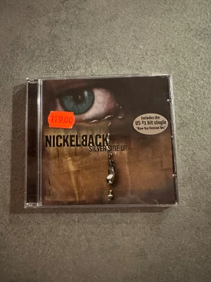 nickelback cd - nyskick, ej spelad av mig