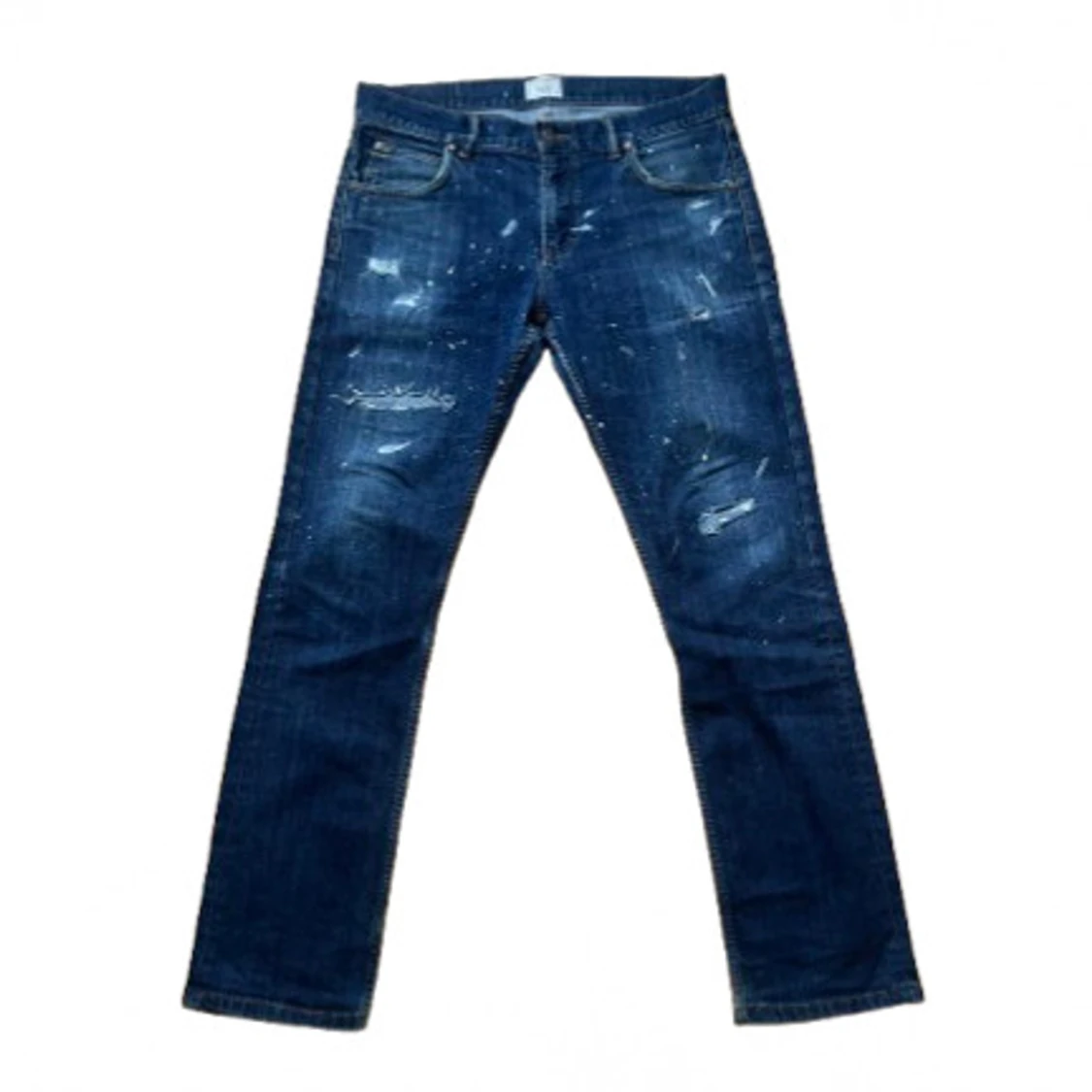 East West slitna blåa jeans
