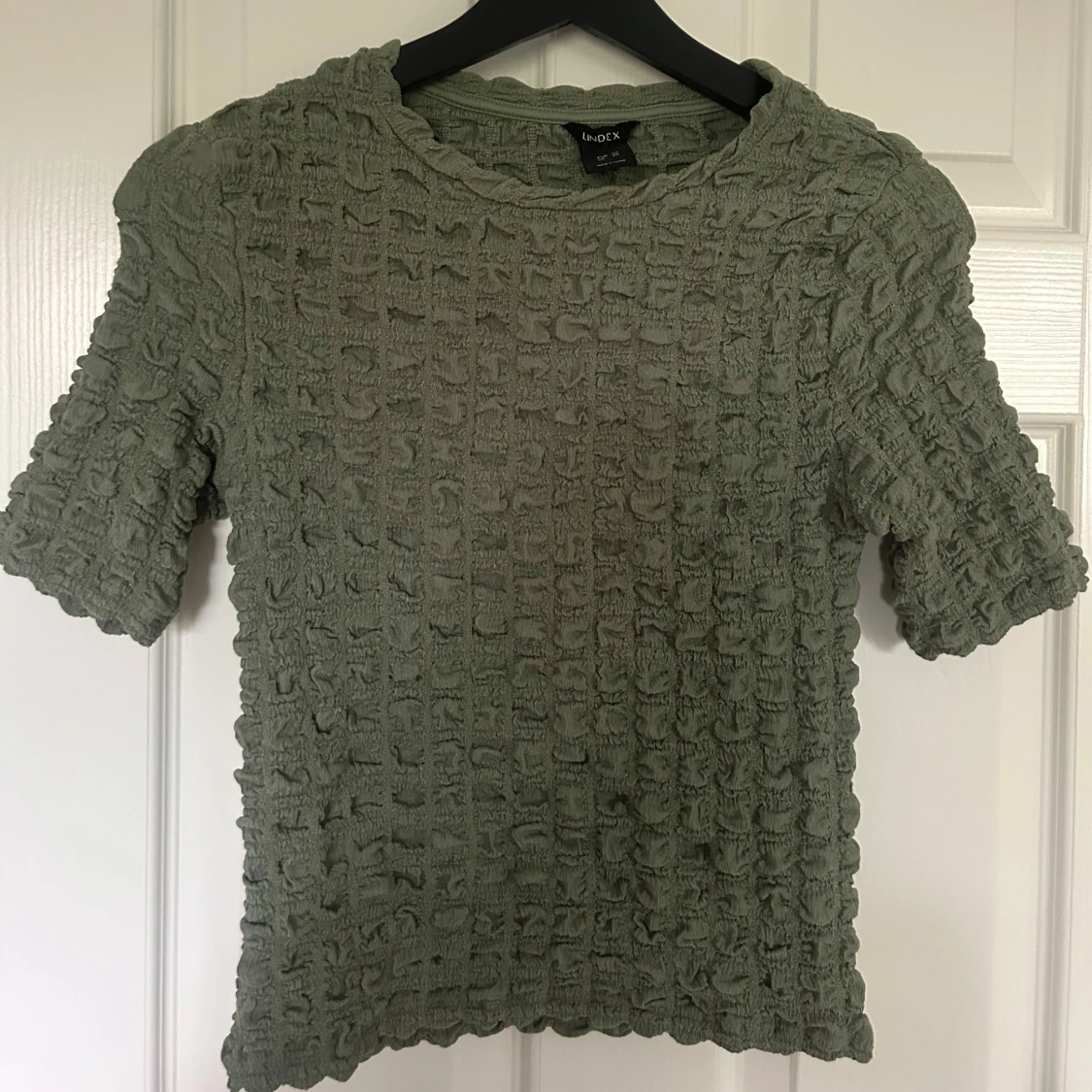 Grön ribbad topp från Lindex XS