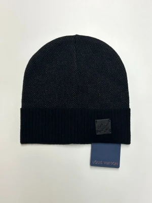 Lv Mössa - Helt ny aldrig använd. Storlek One Size. Snabb frakt.