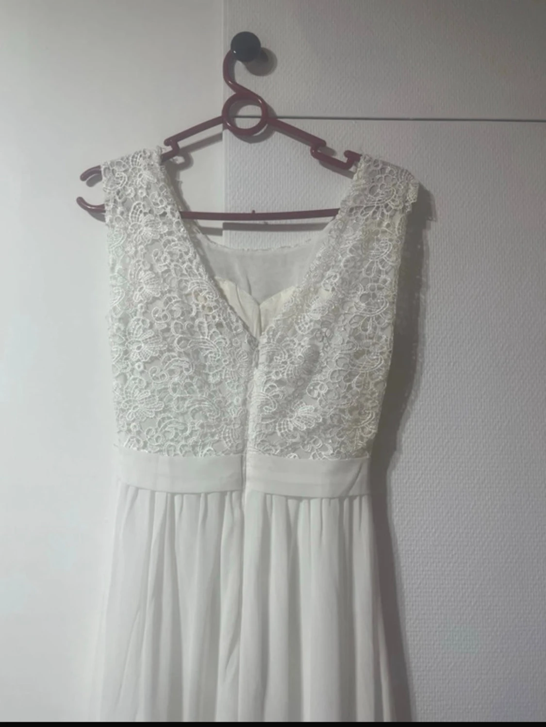 Vet lång spetsklänning