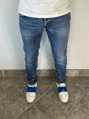 Dondup George Jeans - CONDITION — 9/10 Excellent condition.  Light signs of wear.     SIZE — 33 Model is 170 cm, 67kg  MEASUREMENTS (CM) (Please refer to the last photo for measurement guide)  A — 40 cm  B — 97 cm  C — 15 cm