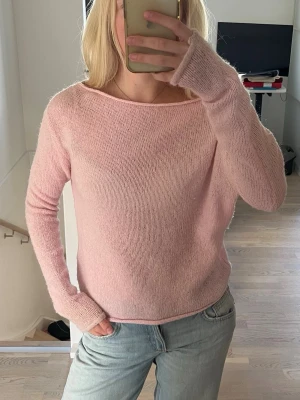 Ljusrosa stickad tröja - Ljusrosa stickad tröja från ginatricot som tyvärr inte kommer till användning!