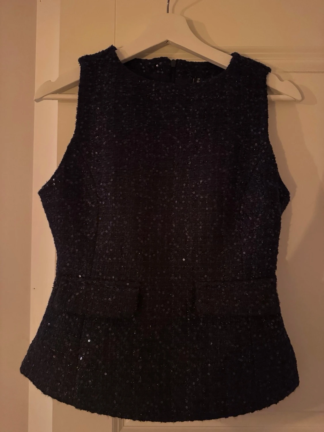 Glittrig ärmlös topp