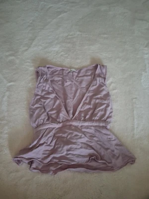 Lila topp - En lila topp från brandy melville!