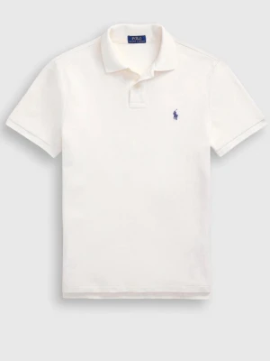 Vit pikétröja från Polo Ralph Lauren - Klassisk vit pikétröja från Polo Ralph Lauren med korta ärmar och blå broderad logga på bröstet. Tröjan har krage och knappar vid halsen. Perfekt till både jeans och shorts för en clean look.