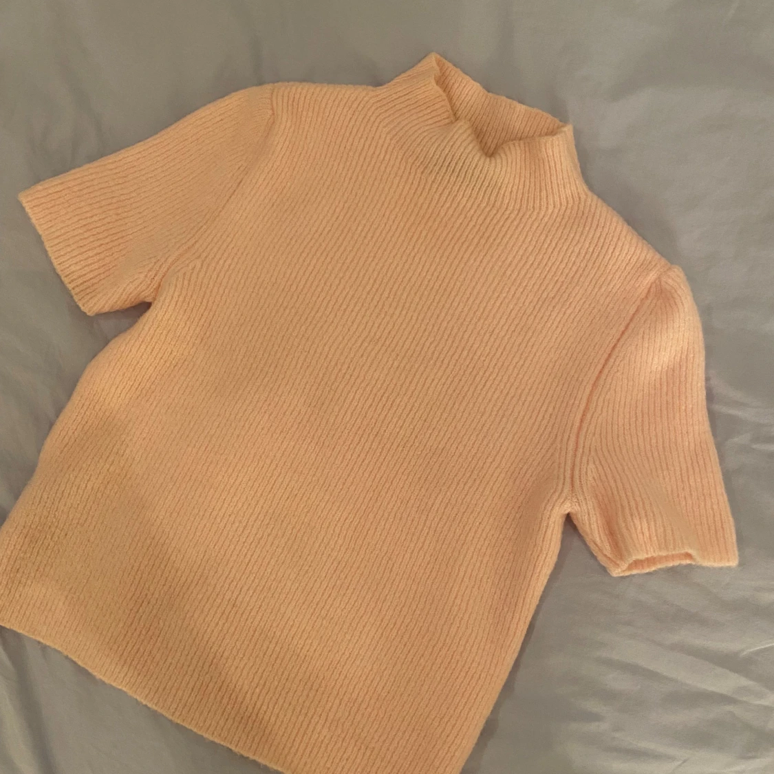 Rosa stickad polo Mango - 1