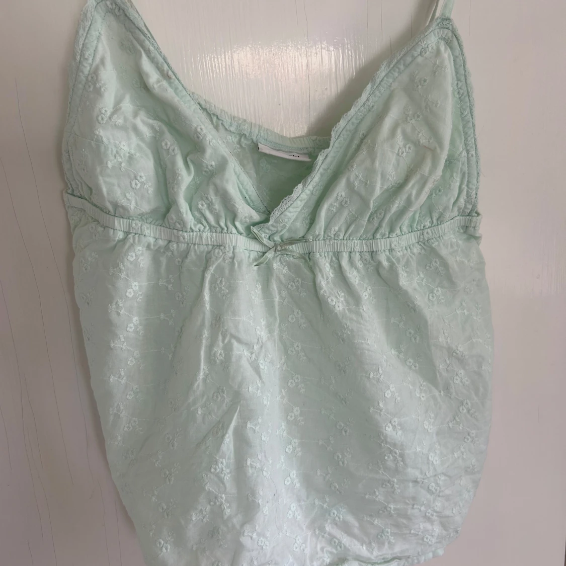 Turkos broderad linnetopp