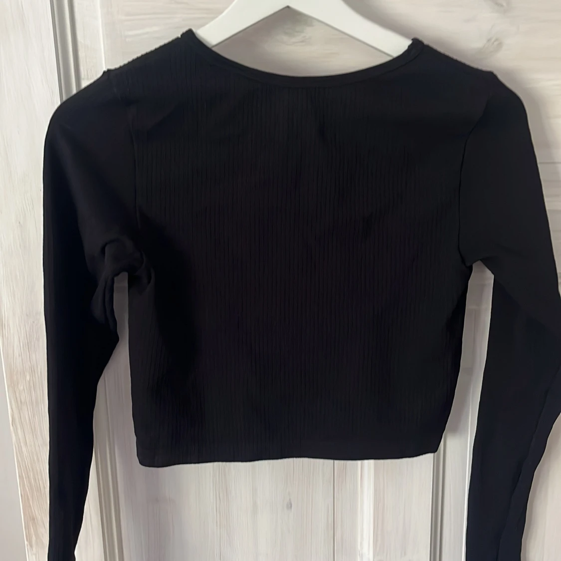 Svart långärmad croppad topp H&M Sport - 1