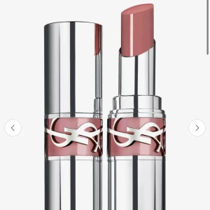 Yves Saint Laurent Loveshine Läppglans - Elegant läppglans från Yves Saint Laurent i nyansen 204. Kommer i en lyxig silverfärgad hylsa med YSL-logotyp. Perfekt för en glansig finish med en touch av färg. Köpt för ca 500 säljer för halva priset, men det gör att diskutera.