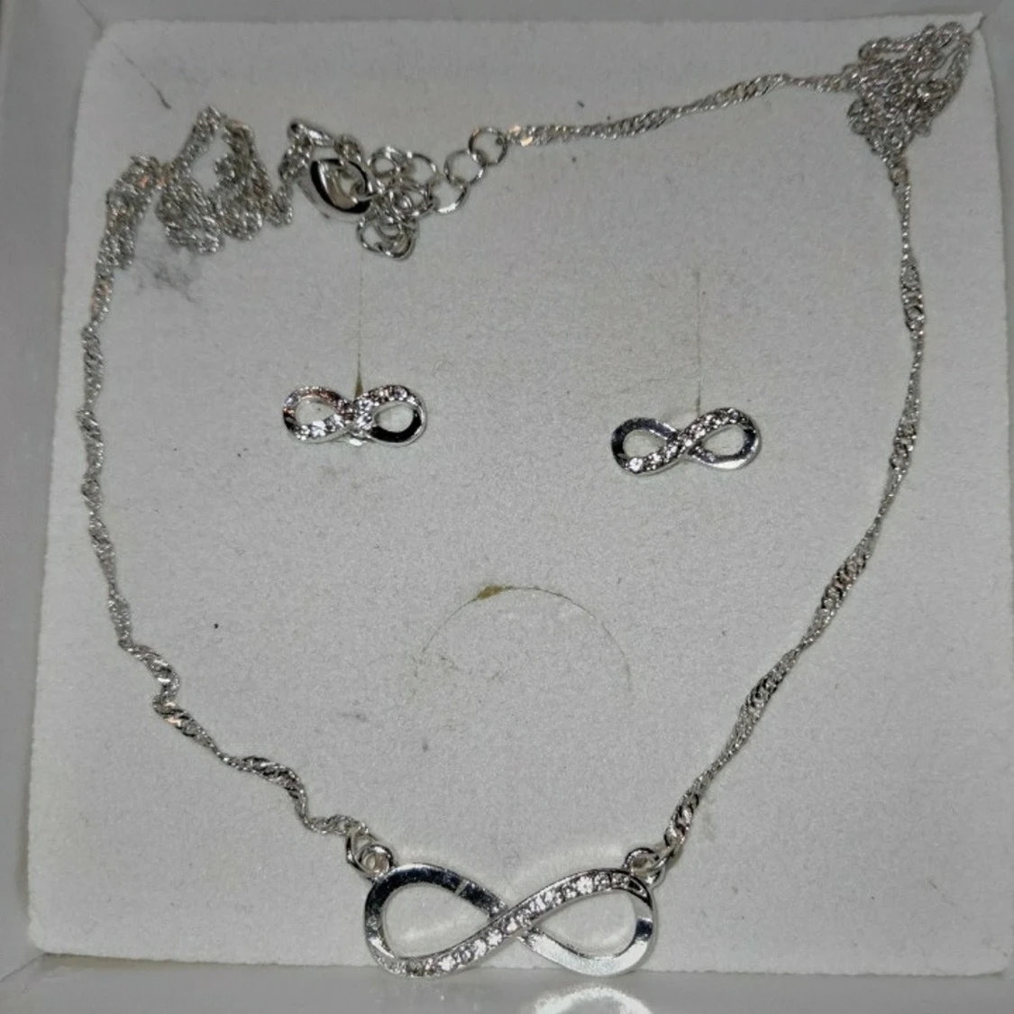 Silverset med evighetssymbol - 1