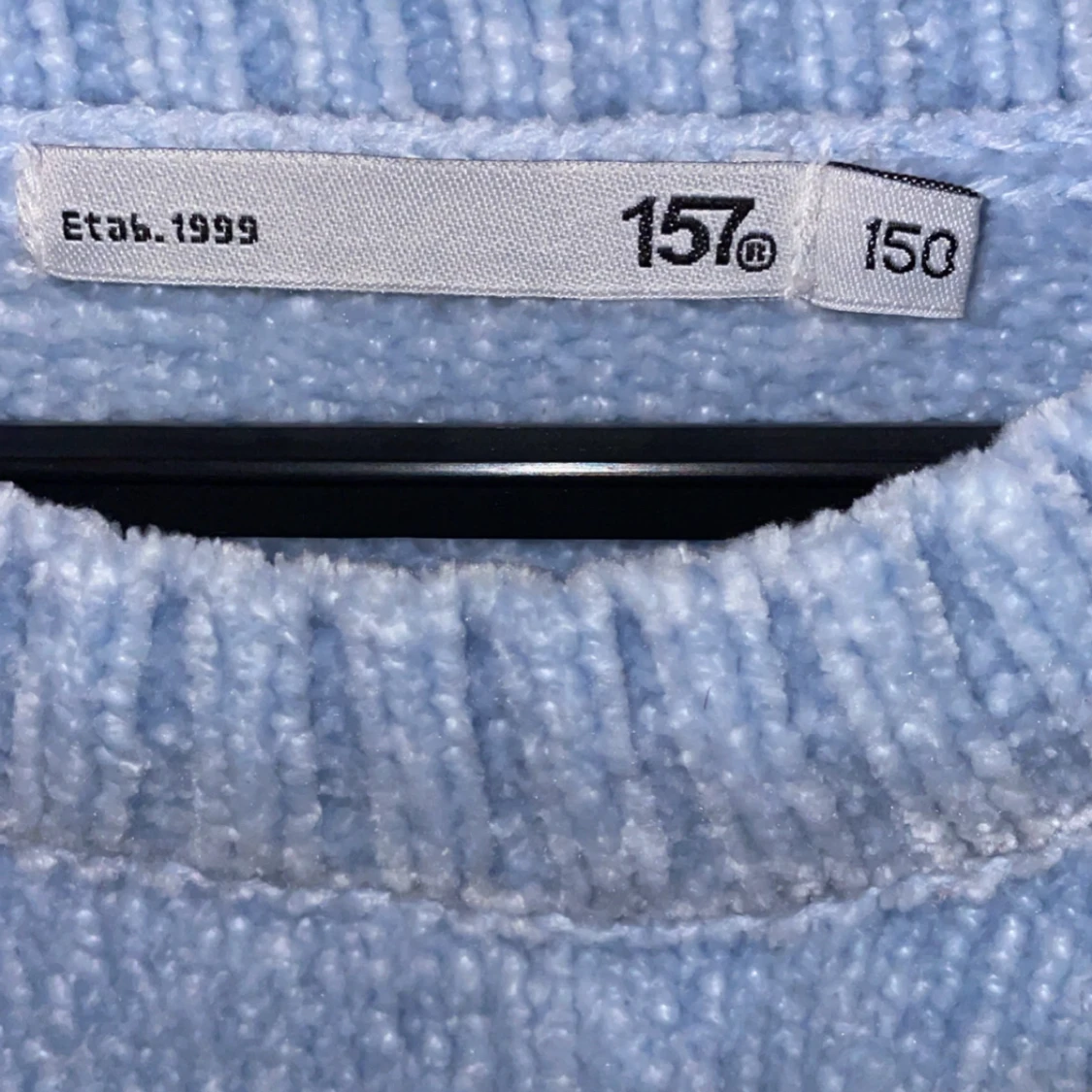 Ljusblå stickad tröja från 157 - 2