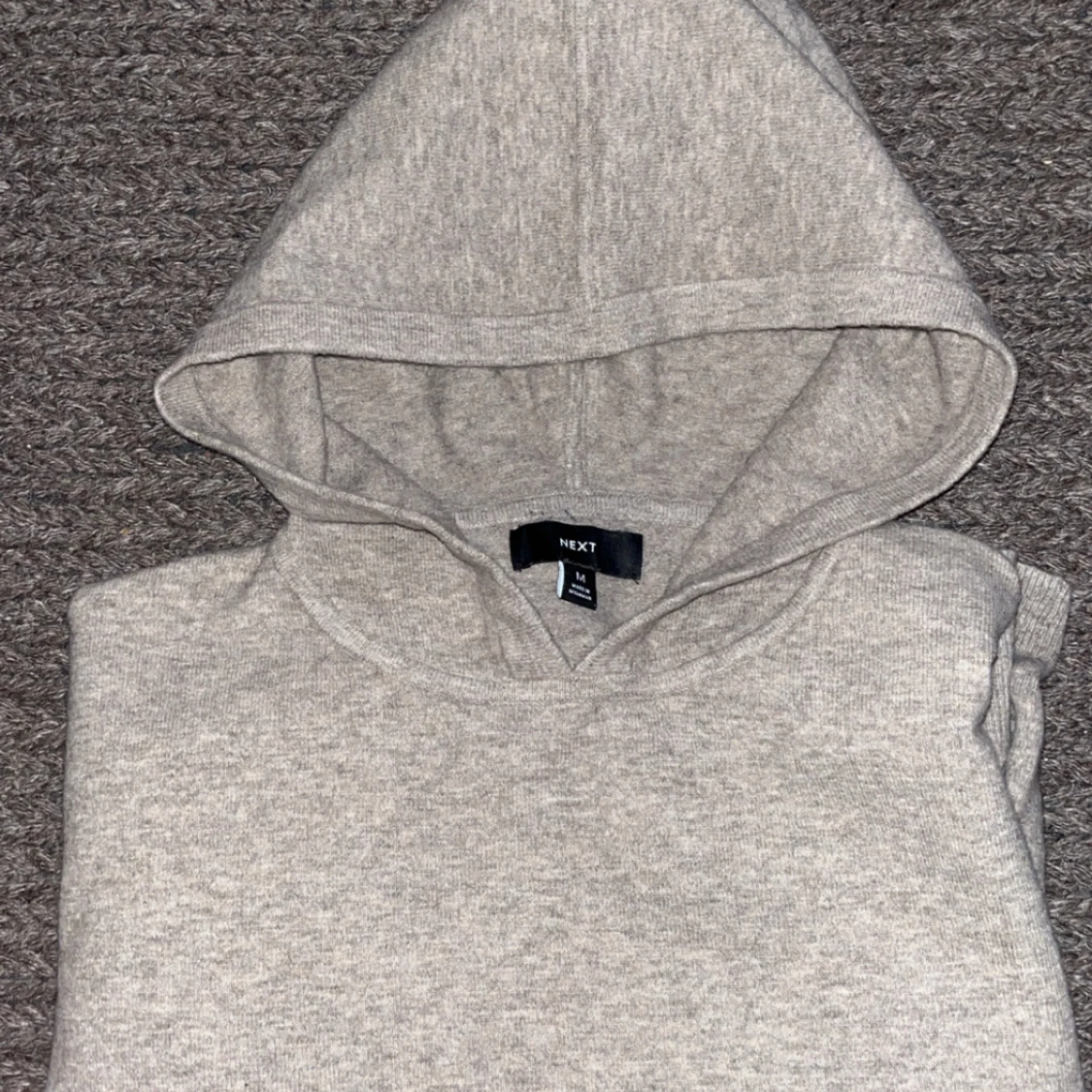 Stickad hoodie