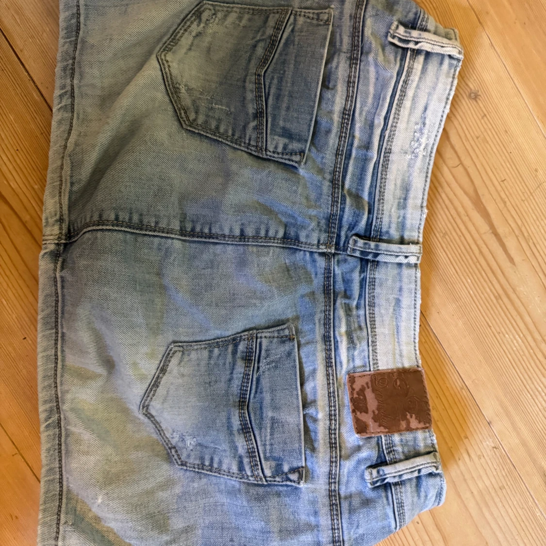 Ljusblå jeanskjol med dragkedjor - 1