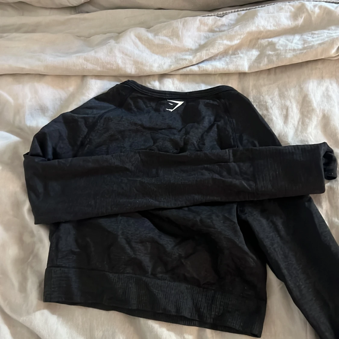 Svart långärmad tröja från Gymshark - 1