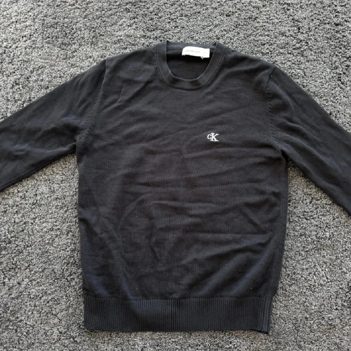 Svart Calvin Klein stickad tröja
