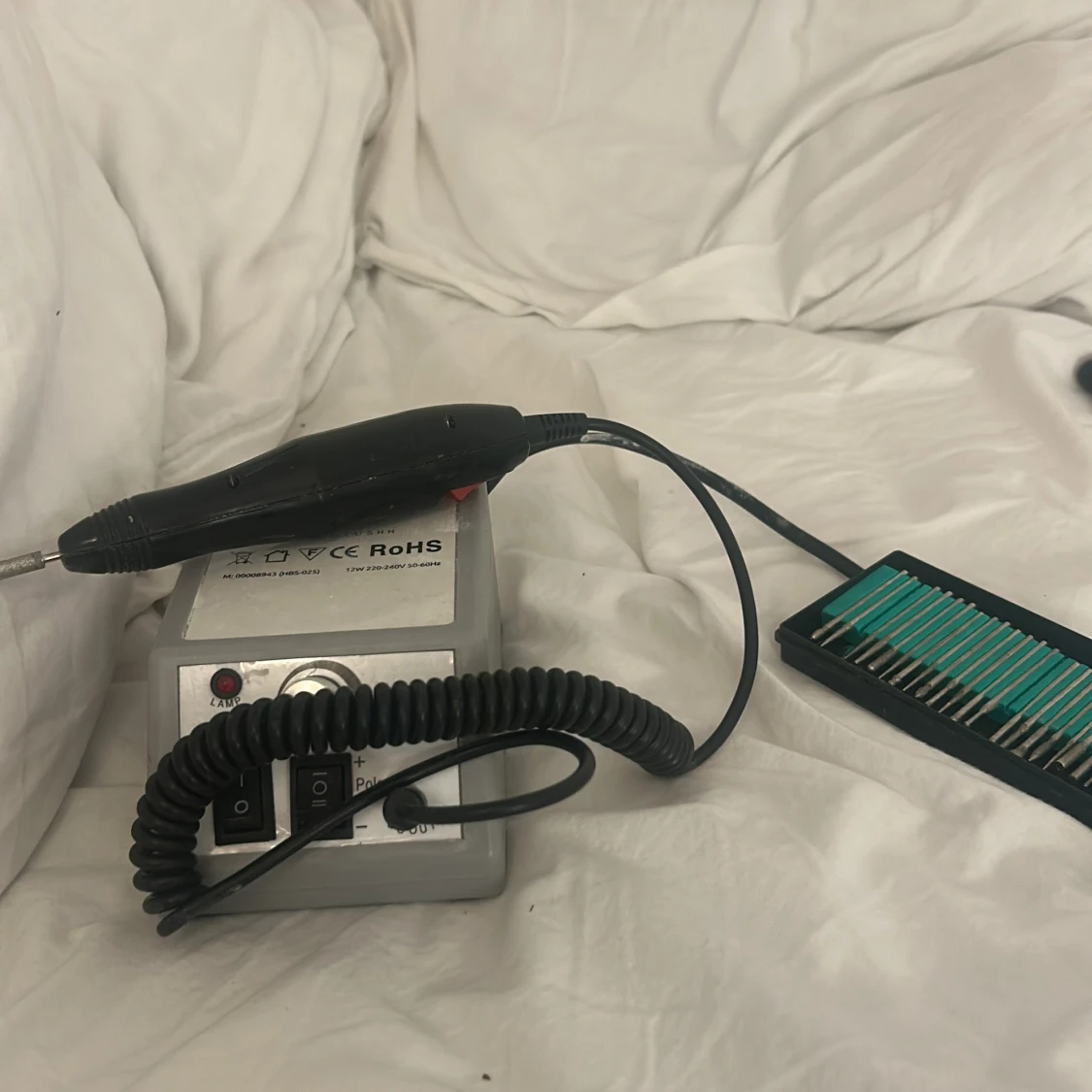 Elektrisk nagelfil med sliphuvuden