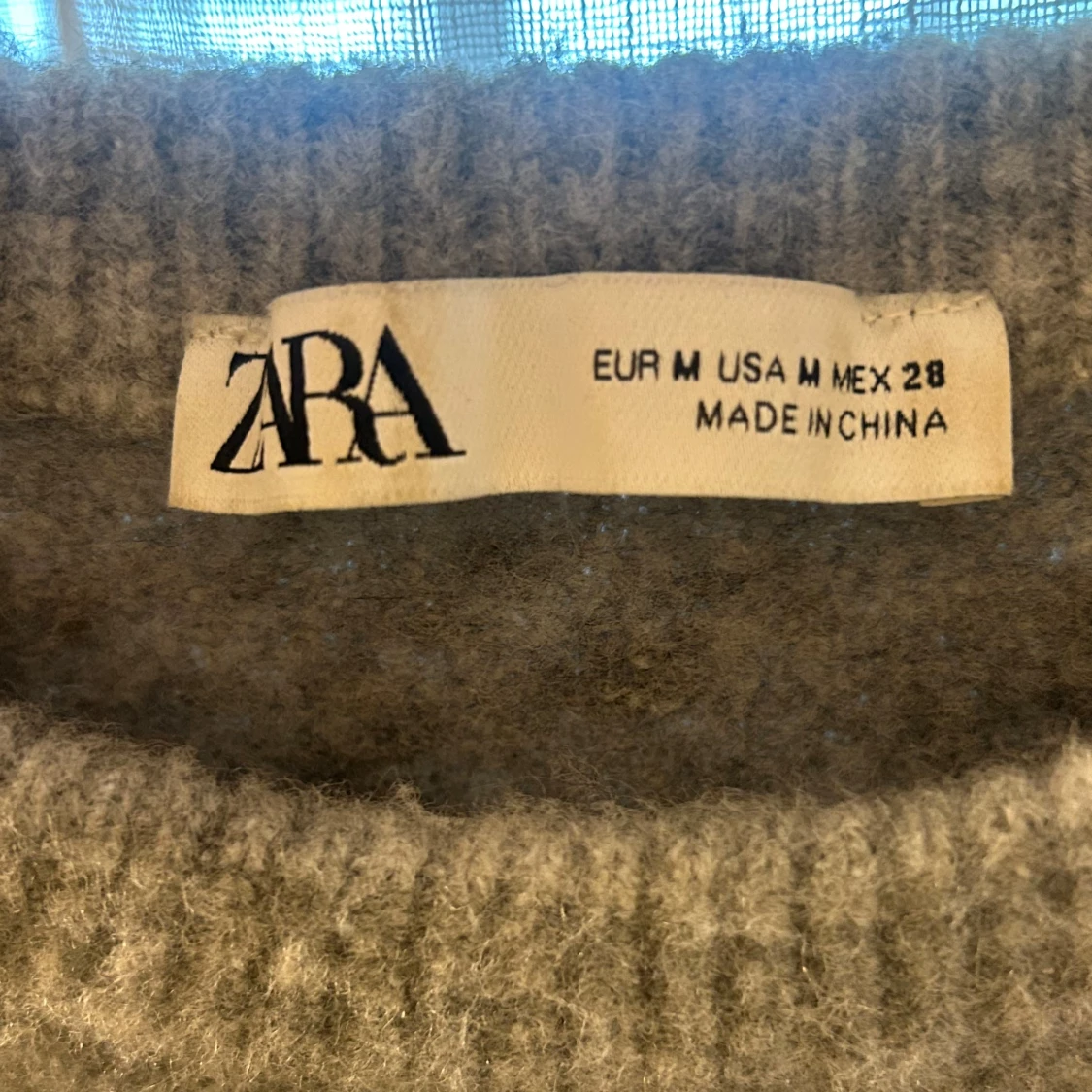 Stickad kortärmad  - 3